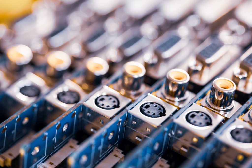 Close-up blurry metal sockets on a computer video board